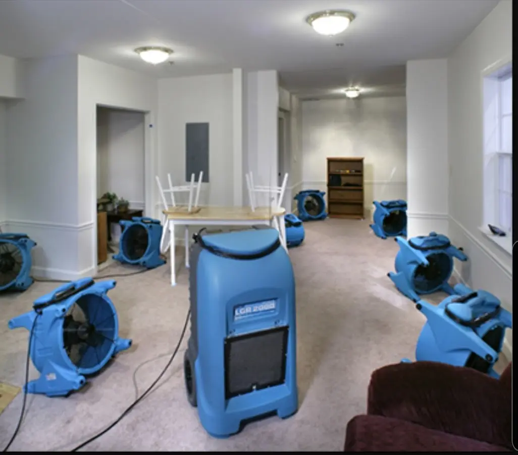 Air movers and dehumidifier setup for Water Damage Restoration in Polson